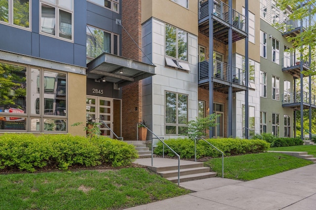 2845 Colfax Ave S Unit W305, Minneapolis, MN 55408 - property entrance featuring brick siding and stucco siding