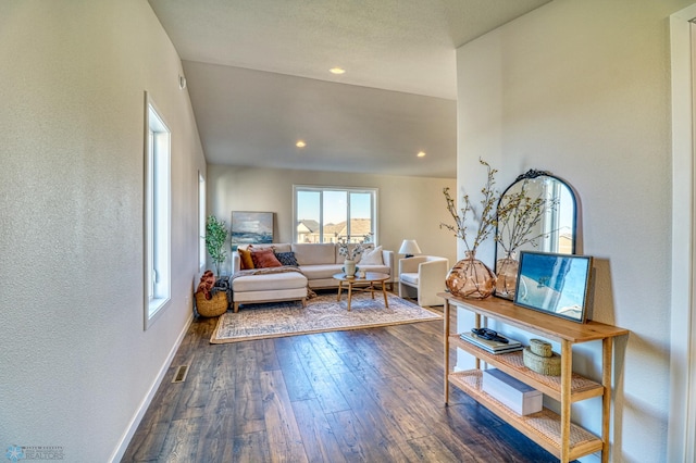 6242 87th Ave S, Horace, ND 58047 - living room featuring dark wood-style floors, baseboards, recessed lighting, and a textured wall