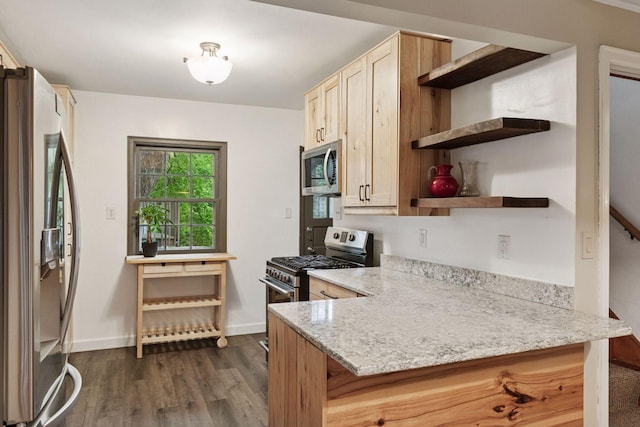 3527 Queen Ave N, Minneapolis, MN 55412 - kitchen with stainless steel appliances, open shelves, dark wood-type flooring, light stone countertops, and a peninsula