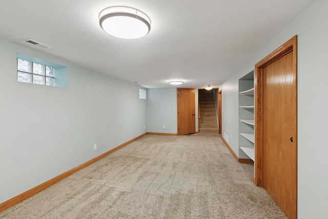 3527 Queen Ave N, Minneapolis, MN 55412 - below grade area with light colored carpet and stairway
