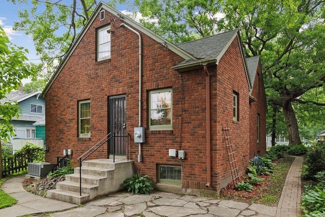 3527 Queen Ave N, Minneapolis, MN 55412 - view of front of home featuring brick siding and a shingled roof