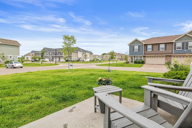 7243 Fall Dr, Lino Lakes, MN 55038 - view of grassy yard featuring a residential view