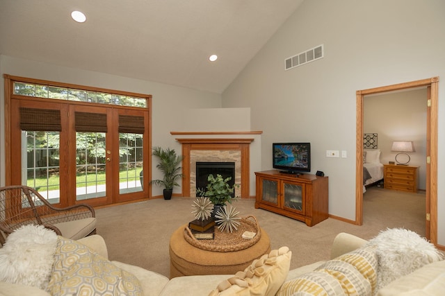 2804 Viola Heights Dr NE, Rochester, MN 55906 - carpeted living room with high vaulted ceiling, baseboards, recessed lighting, and a fireplace