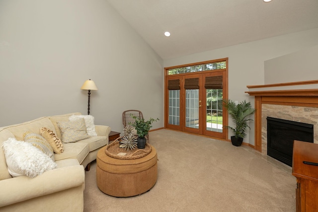 2804 Viola Heights Dr NE, Rochester, MN 55906 - carpeted living area with a premium fireplace, baseboards, recessed lighting, and high vaulted ceiling