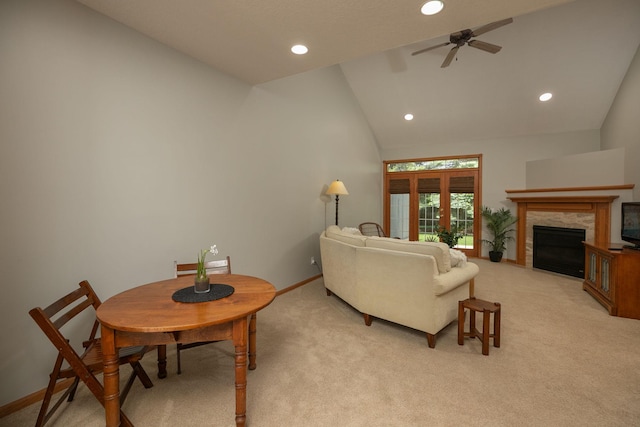 2804 Viola Heights Dr NE, Rochester, MN 55906 - living room with light carpet, lofted ceiling, recessed lighting, ceiling fan, and a stone fireplace