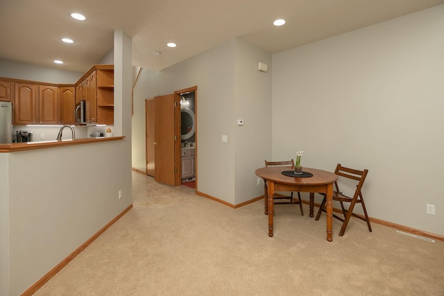 2804 Viola Heights Dr NE, Rochester, MN 55906 - dining area featuring light carpet, recessed lighting, and baseboards