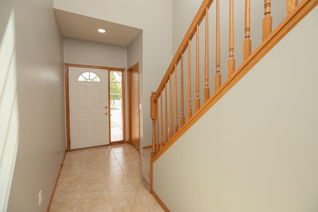 2804 Viola Heights Dr NE, Rochester, MN 55906 - foyer featuring baseboards, stairs, recessed lighting, and light tile patterned floors