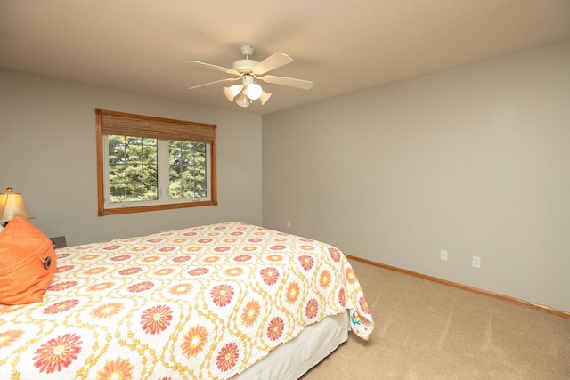 2804 Viola Heights Dr NE, Rochester, MN 55906 - bedroom featuring light carpet, a ceiling fan, and baseboards