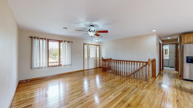 1364 Lone Stone Ct SE, Chatfield, MN 55923 - empty room featuring light wood-type flooring, ceiling fan, baseboards, and recessed lighting