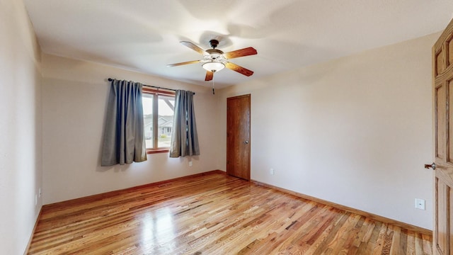 1364 Lone Stone Ct SE, Chatfield, MN 55923 - spare room with ceiling fan, light wood finished floors, and baseboards