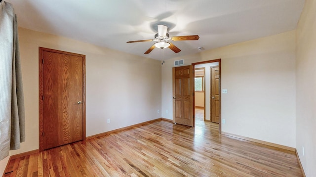1364 Lone Stone Ct SE, Chatfield, MN 55923 - empty room with light wood finished floors, a ceiling fan, and baseboards