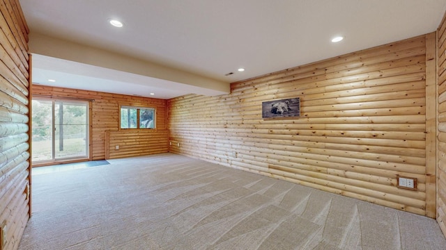 1364 Lone Stone Ct SE, Chatfield, MN 55923 - carpeted spare room featuring log walls and recessed lighting