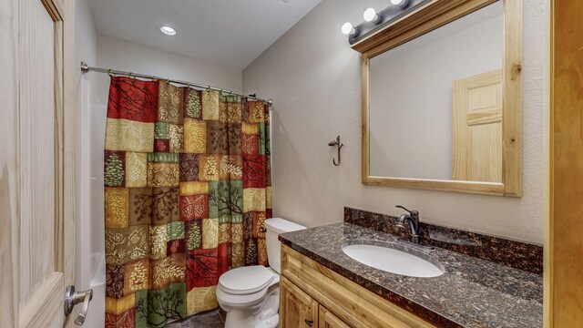 1364 Lone Stone Ct SE, Chatfield, MN 55923 - bathroom with toilet, vanity, and a shower with shower curtain