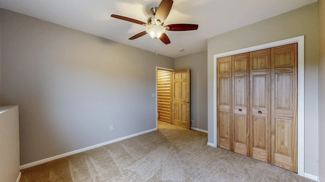 1364 Lone Stone Ct SE, Chatfield, MN 55923 - unfurnished bedroom with light colored carpet, baseboards, a closet, and ceiling fan
