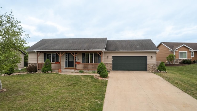 1364 Lone Stone Ct SE, Chatfield, MN 55923 - ranch-style house featuring an attached garage, a porch, a front lawn, concrete driveway, and roof with shingles