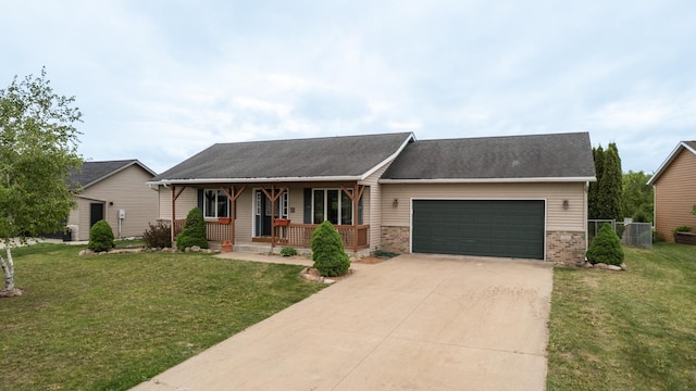 1364 Lone Stone Ct SE, Chatfield, MN 55923 - view of front of house featuring a porch, an attached garage, brick siding, driveway, and central AC