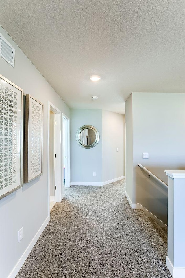 890 Laurel Ct, Chaska, MN 55318 - carpeted empty room with baseboards and a textured ceiling