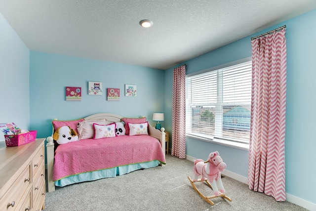 890 Laurel Ct, Chaska, MN 55318 - bedroom with carpet floors, a textured ceiling, and baseboards