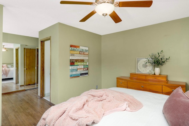 123 Windsor Ct, New Brighton, MN 55112 - bedroom featuring wood finished floors and ceiling fan