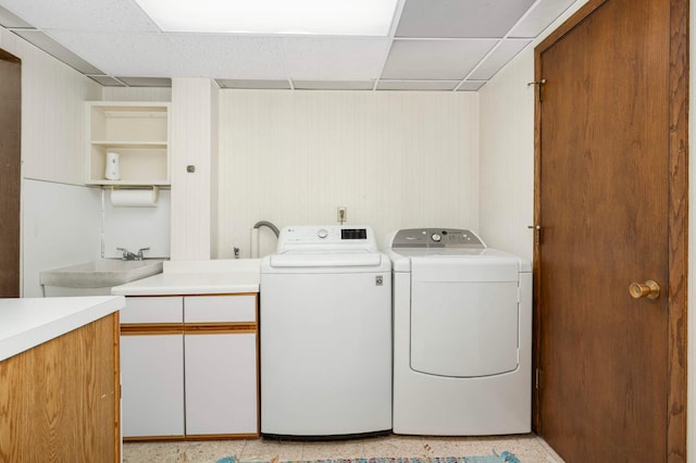 123 Windsor Ct, New Brighton, MN 55112 - laundry area with washer and dryer, cabinet space, and wood walls