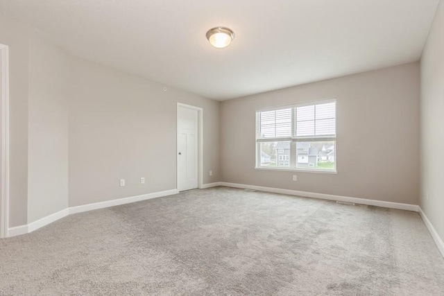 20025 62nd Pl, Corcoran, MN 55340 - unfurnished room featuring carpet floors and baseboards