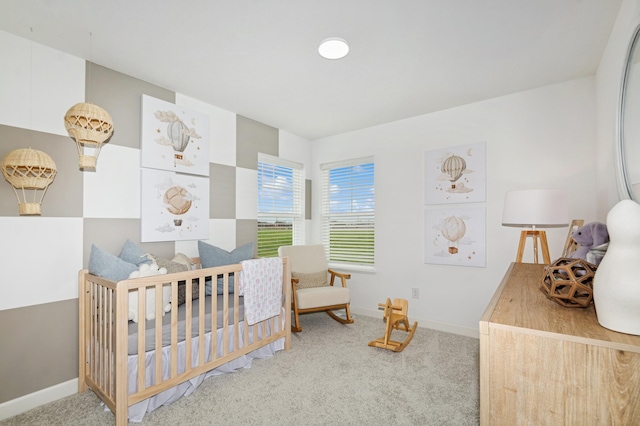 20025 62nd Pl, Corcoran, MN 55340 - carpeted bedroom with baseboards and a crib