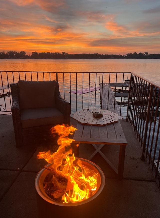 16263 Amelia Rd, Glenwood Twp, MN 56334 - balcony with a fire pit and a water view