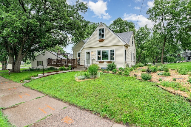 5805 Sunrise Dr, Minneapolis, MN 55419 - bungalow-style house with a wooden deck and a front yard