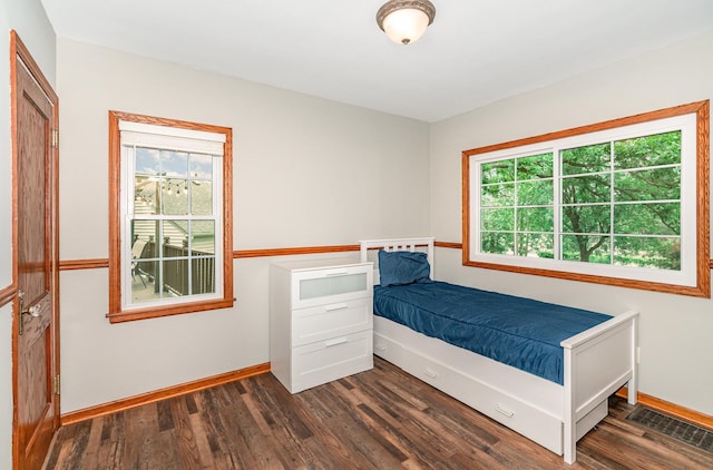 5805 Sunrise Dr, Minneapolis, MN 55419 - unfurnished bedroom featuring dark wood-type flooring