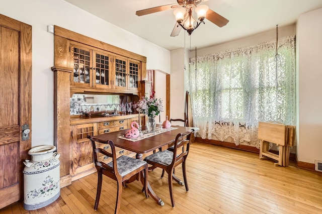 1107 Edmund Ave, Saint Paul, MN 55104 - dining space featuring a ceiling fan and light wood-style flooring