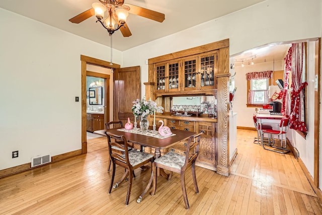1107 Edmund Ave, Saint Paul, MN 55104 - dining space with a ceiling fan and light wood-type flooring