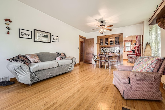 1107 Edmund Ave, Saint Paul, MN 55104 - living room featuring light wood-style floors and a ceiling fan