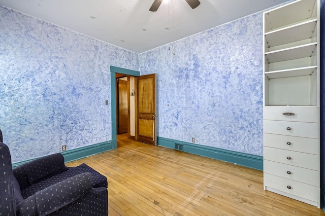 1107 Edmund Ave, Saint Paul, MN 55104 - sitting room featuring wallpapered walls, hardwood / wood-style floors, and ceiling fan