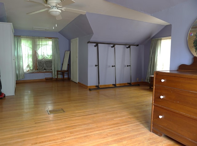 1107 Edmund Ave, Saint Paul, MN 55104 - bonus room with lofted ceiling, healthy amount of natural light, light wood-style flooring, and ceiling fan