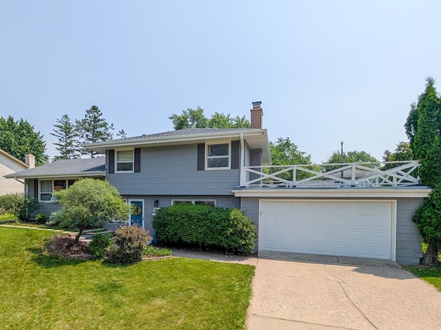 3466 Yukon Ave N, New Hope, MN 55427 - tri-level home with a chimney, concrete driveway, a front yard, and brick siding