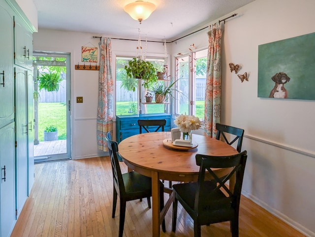 3466 Yukon Ave N, New Hope, MN 55427 - dining space featuring light wood finished floors and baseboards