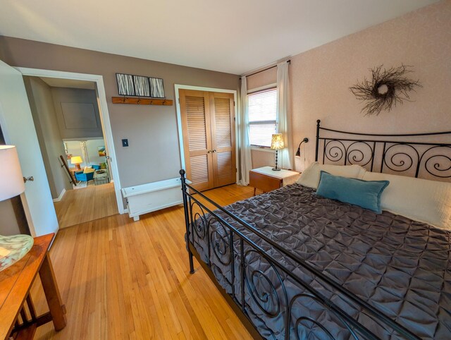 3466 Yukon Ave N, New Hope, MN 55427 - bedroom featuring a closet and light wood-style flooring