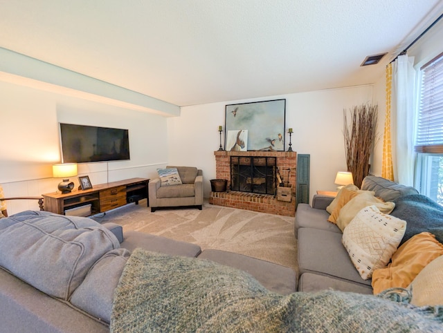 3466 Yukon Ave N, New Hope, MN 55427 - living area with plenty of natural light, a fireplace, and carpet floors