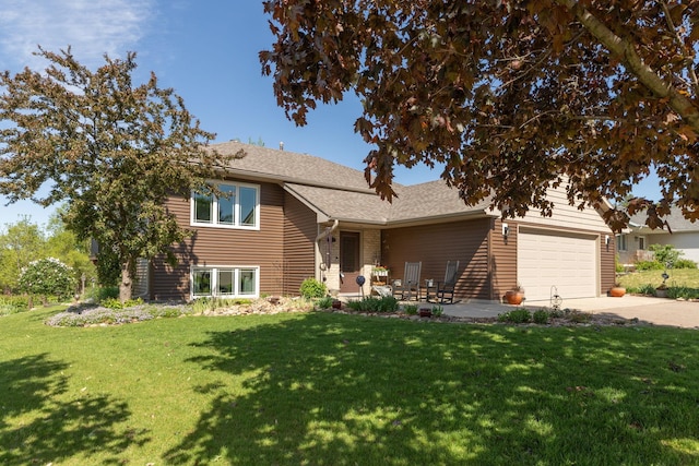 420 Cedar Ct NE, Pine Island, MN 55963 - split level home with concrete driveway, an attached garage, a front yard, and a shingled roof