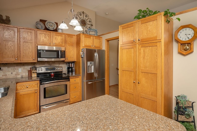 420 Cedar Ct NE, Pine Island, MN 55963 - kitchen featuring appliances with stainless steel finishes, backsplash, hanging light fixtures, lofted ceiling, and light stone counters