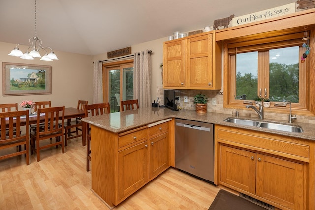 420 Cedar Ct NE, Pine Island, MN 55963 - kitchen with dishwasher, a sink, a peninsula, healthy amount of natural light, and lofted ceiling