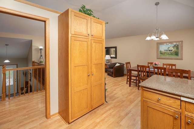 420 Cedar Ct NE, Pine Island, MN 55963 - kitchen with light wood-type flooring, a chandelier, and decorative light fixtures