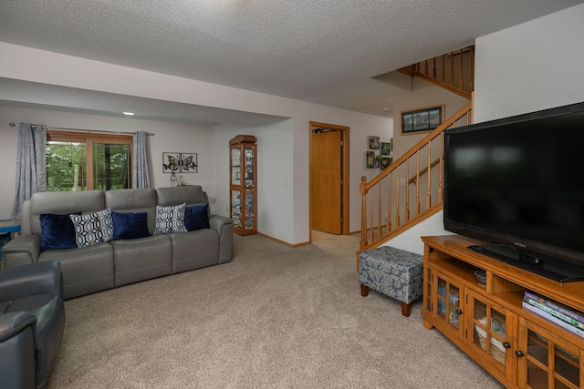 420 Cedar Ct NE, Pine Island, MN 55963 - living room featuring light carpet, stairs, and a textured ceiling