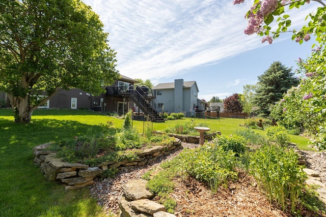 420 Cedar Ct NE, Pine Island, MN 55963 - view of yard featuring stairs and a deck
