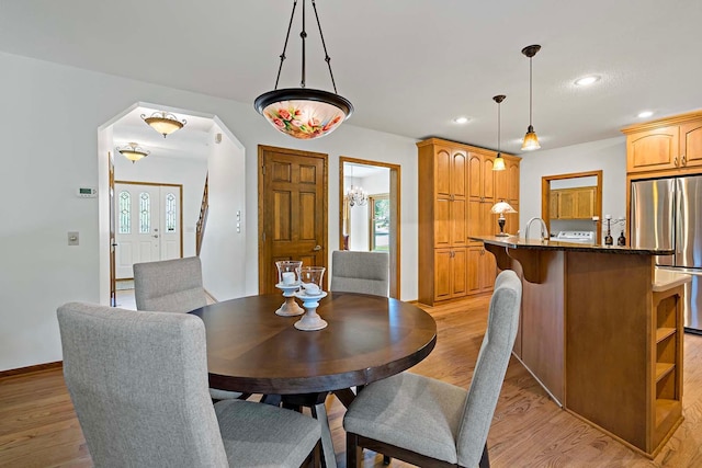 13545 Glasgow Ln, Apple Valley, MN 55124 - dining space with recessed lighting, light wood-style floors, and baseboards