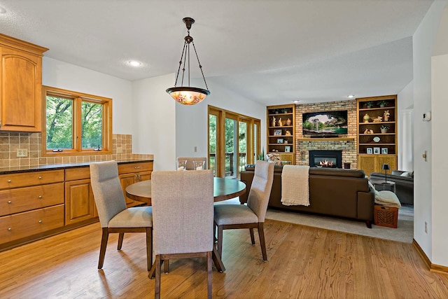 13545 Glasgow Ln, Apple Valley, MN 55124 - dining space featuring healthy amount of natural light, light wood-style floors, built in features, and recessed lighting