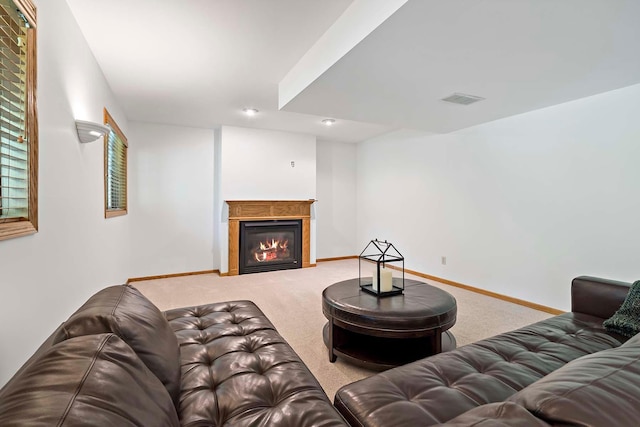 13545 Glasgow Ln, Apple Valley, MN 55124 - carpeted living room featuring a glass covered fireplace, baseboards, and recessed lighting