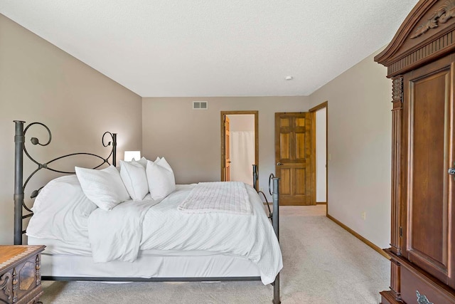13545 Glasgow Ln, Apple Valley, MN 55124 - bedroom with light carpet, baseboards, and a textured ceiling