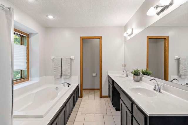 13545 Glasgow Ln, Apple Valley, MN 55124 - full bathroom with a textured ceiling, double vanity, a garden tub, tile patterned floors, and baseboards