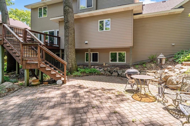 13545 Glasgow Ln, Apple Valley, MN 55124 - view of patio featuring stairs and a wooden deck